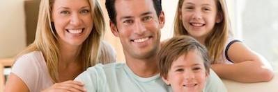 family hugging l dentist emmaus