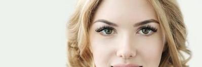 woman with blonde hair smiling l invisalign emmaus