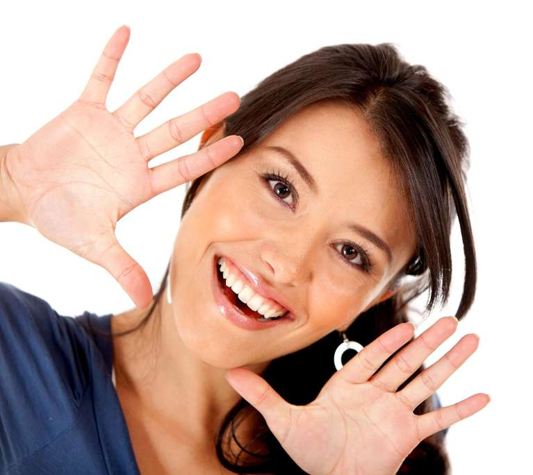 patient putting in clear plastic aligner l invisalign allentown pa