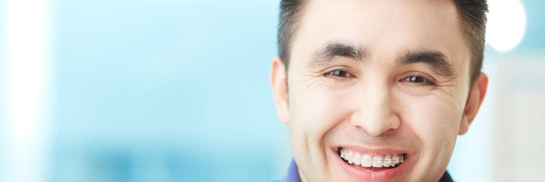 man with brown hair smiling | allentown dentist