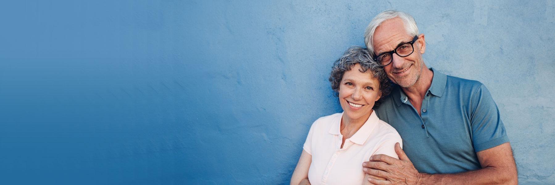 older couple wwith blue background l best allentown dentist