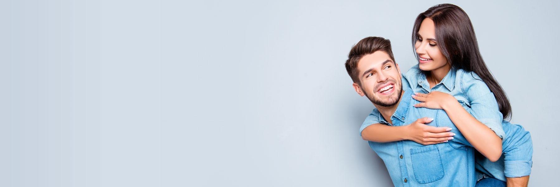 young couple hugging l invisalign allentown pa