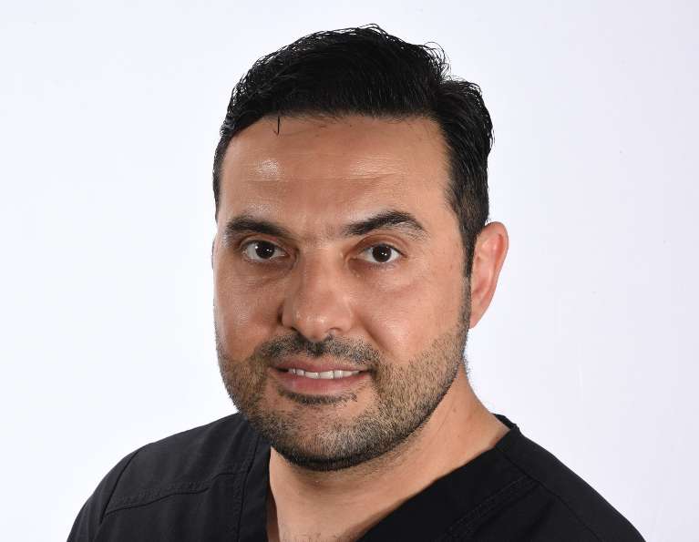 Rafal, a registered dental hygienist at Evolve Dental Care
