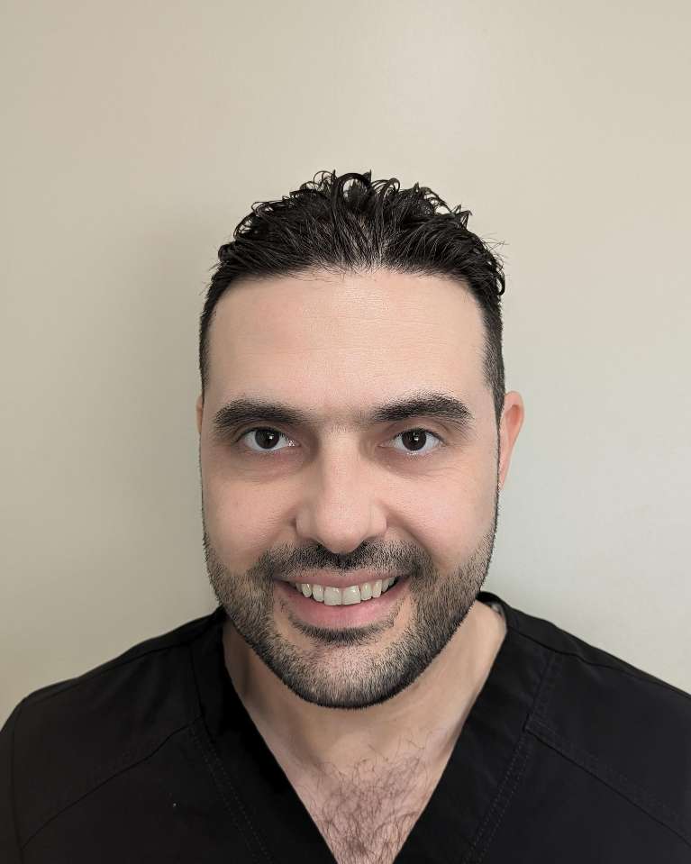 Rafal, a registered dental hygienist at Evolve Dental Care
